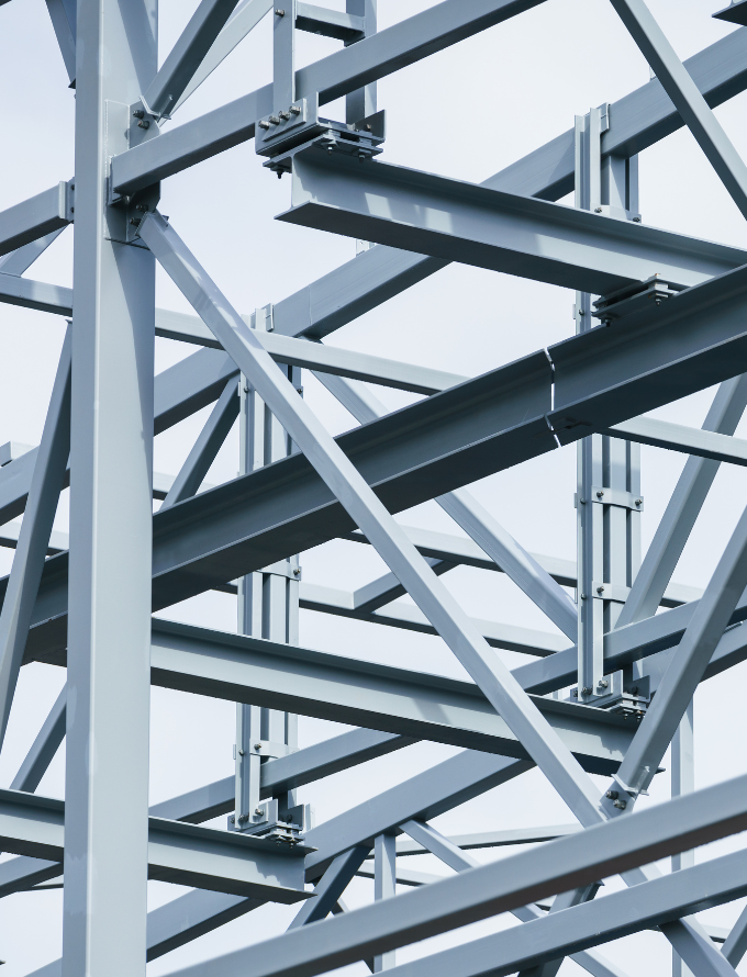 Close-up view of steel beams forming a structural framework.